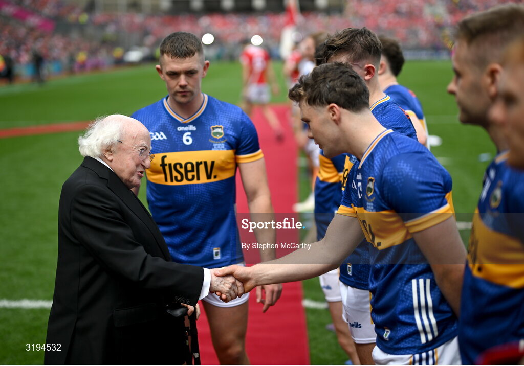 20 July 2025; President of Ireland Michael D Higgins is introduced to Tipperary's Darragh McCarthy by captain Ronan Maher before the GAA Hurling All-Ireland Senior Championship final match between Cork and Tipperary at Croke Park in Dublin. Photo by Stephen McCarthy/Sportsfile