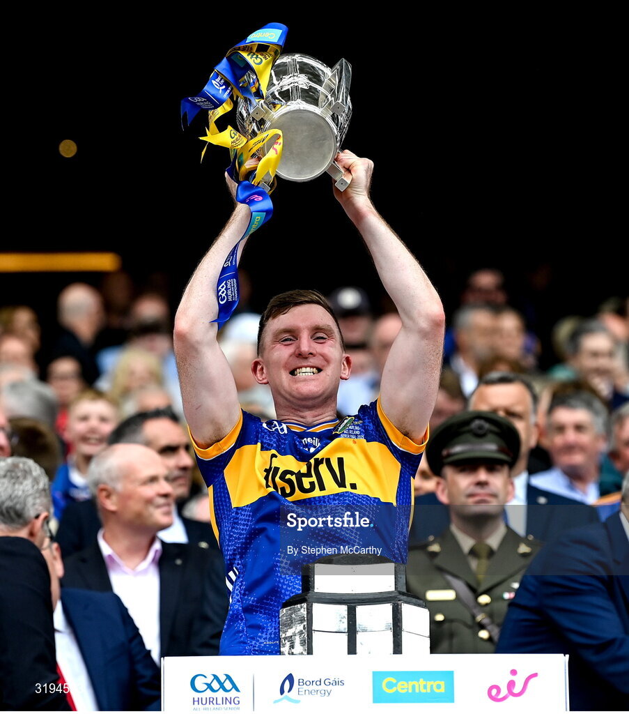 20 July 2025; Seamus Kennedy of Tipperary lifts the Liam MacCarthy cup after victory in the GAA Hurling All-Ireland Senior Championship final match between Cork and Tipperary at Croke Park in Dublin. Photo by Stephen McCarthy/Sportsfile