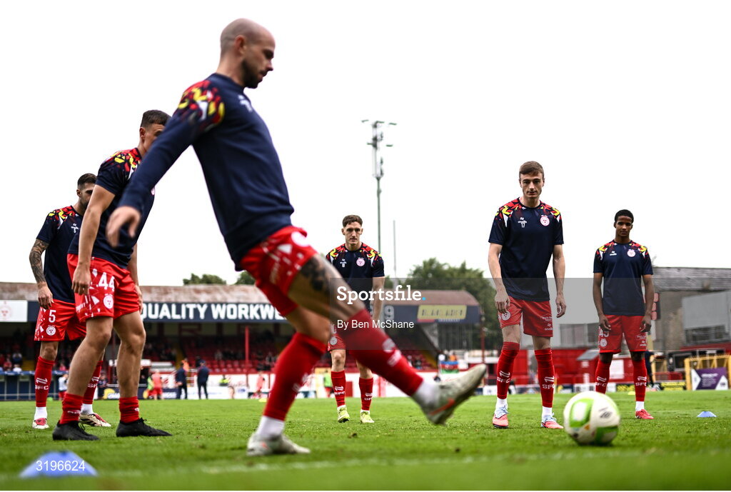 23 July 2025; Shelbourne players warm up before the UEFA Champions League Second Qualifying Round first leg match between Shelbourne and Qarabag FK at Tolka Park in Dublin. Photo by Ben McShane/Sportsfile