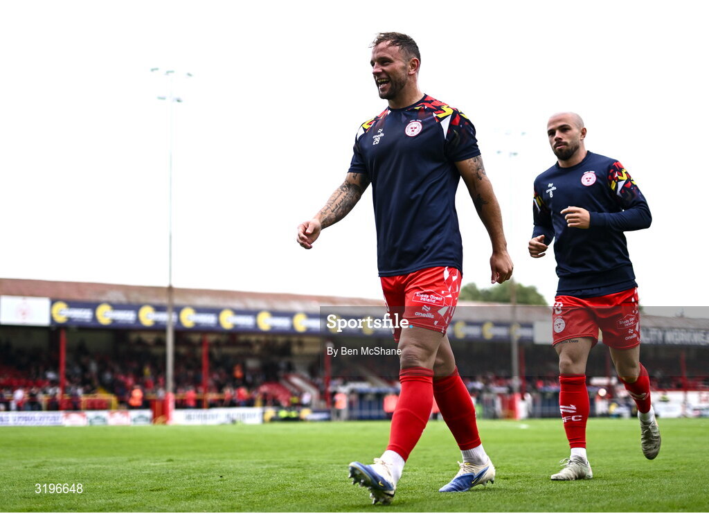 23 July 2025; Paddy Barrett of Shelbourne, left, and teammate Mark Coyle before the UEFA Champions League Second Qualifying Round first leg match between Shelbourne and Qarabag FK at Tolka Park in Dublin. Photo by Ben McShane/Sportsfile