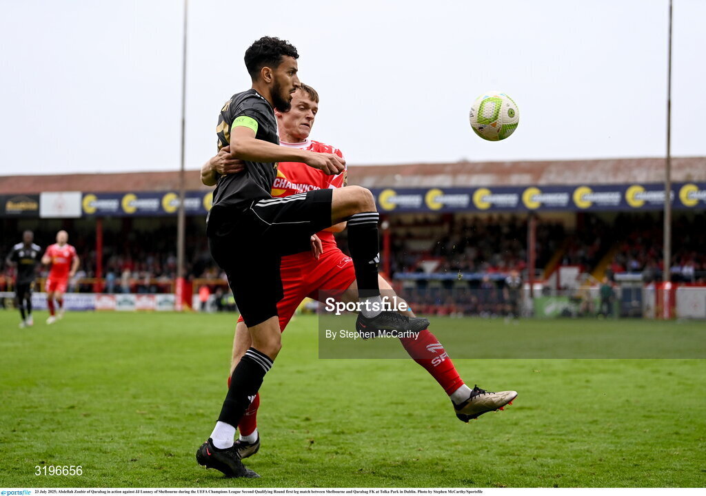 23 July 2025; Abdellah Zoubir of Qarabag in action against JJ Lunney of Shelbourne during the UEFA Champions League Second Qualifying Round first leg match between Shelbourne and Qarabag FK at Tolka Park in Dublin. Photo by Stephen McCarthy/Sportsfile