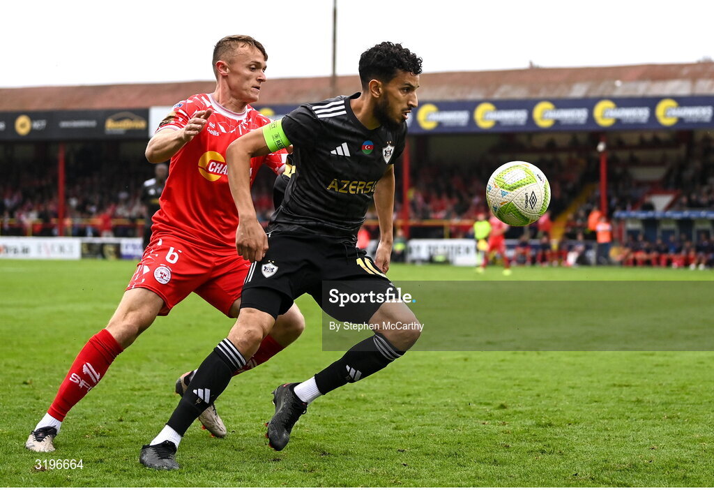 23 July 2025; Abdellah Zoubir of Qarabag in action against JJ Lunney of Shelbourne during the UEFA Champions League Second Qualifying Round first leg match between Shelbourne and Qarabag FK at Tolka Park in Dublin. Photo by Stephen McCarthy/Sportsfile