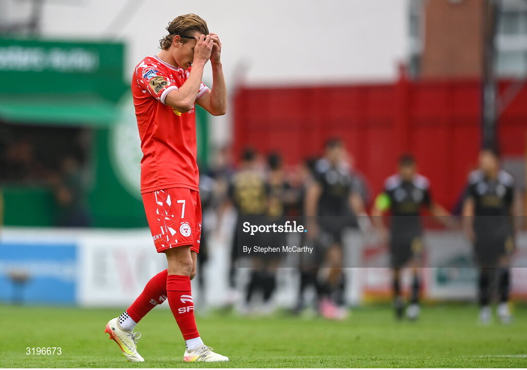 23 July 2025; Harry Wood of Shelbourne reacts after his side concede a first goal during the UEFA Champions League Second Qualifying Round first leg match between Shelbourne and Qarabag FK at Tolka Park in Dublin. Photo by Stephen McCarthy/Sportsfile