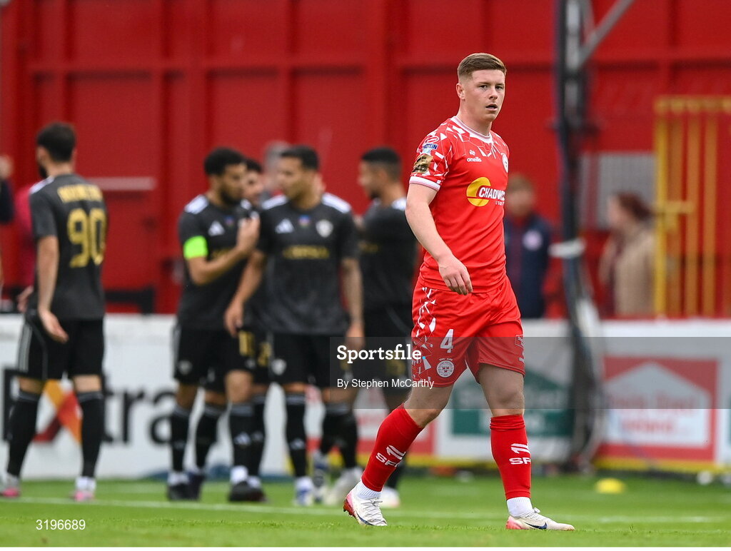 23 July 2025; Kameron Ledwidge of Shelbourne reacts after his side concede a first goal during the UEFA Champions League Second Qualifying Round first leg match between Shelbourne and Qarabag FK at Tolka Park in Dublin. Photo by Stephen McCarthy/Sportsfile