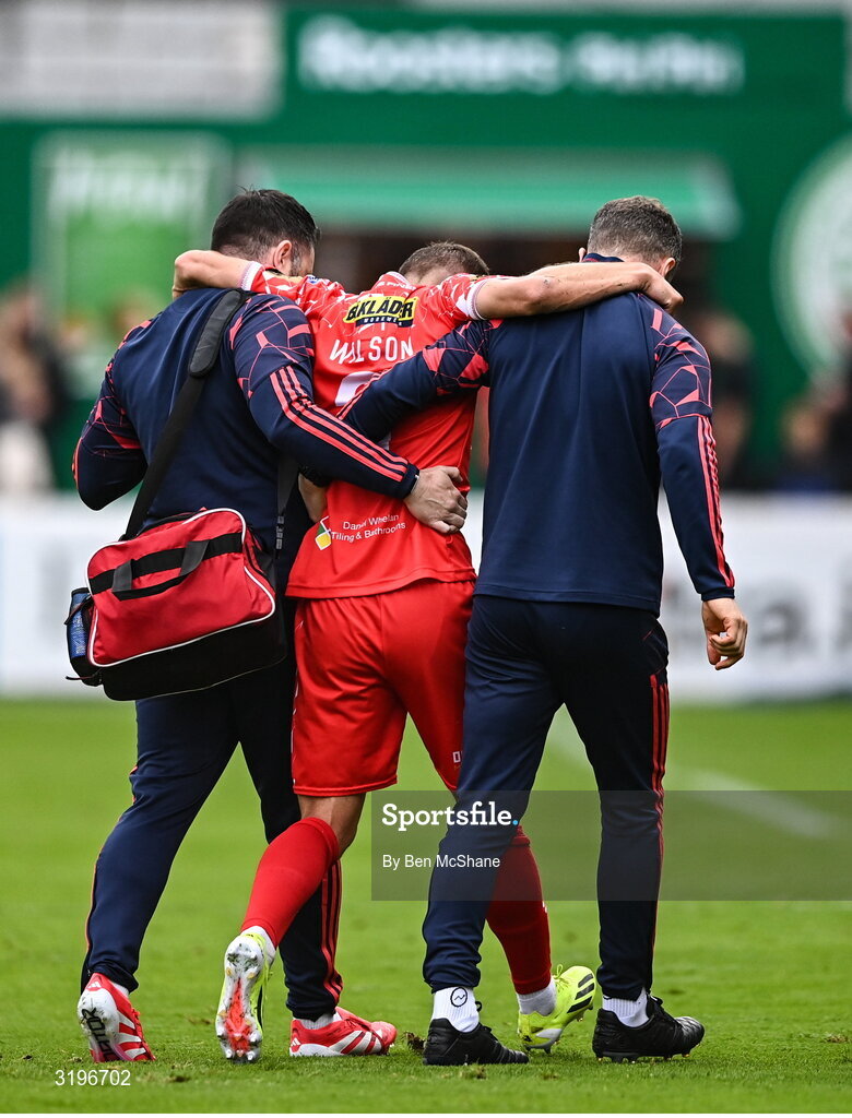 23 July 2025; Tyreke Wilson of Shelbourne leaves the field after picking up an injury during the UEFA Champions League Second Qualifying Round first leg match between Shelbourne and Qarabag FK at Tolka Park in Dublin. Photo by Ben McShane/Sportsfile