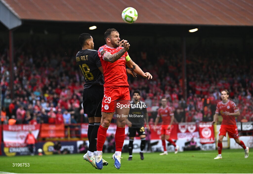 23 July 2025; Paddy Barrett of Shelbourne in action against Dani Bolt of Qarabag during the UEFA Champions League Second Qualifying Round first leg match between Shelbourne and Qarabag FK at Tolka Park in Dublin. Photo by Ben McShane/Sportsfile