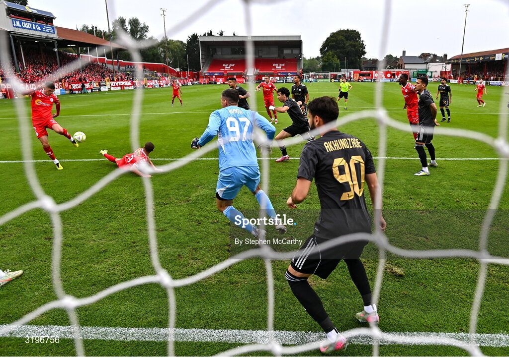 23 July 2025; Sean Gannon of Shelbourne, far left, has a shot on goal during the UEFA Champions League Second Qualifying Round first leg match between Shelbourne and Qarabag FK at Tolka Park in Dublin. Photo by Stephen McCarthy/Sportsfile