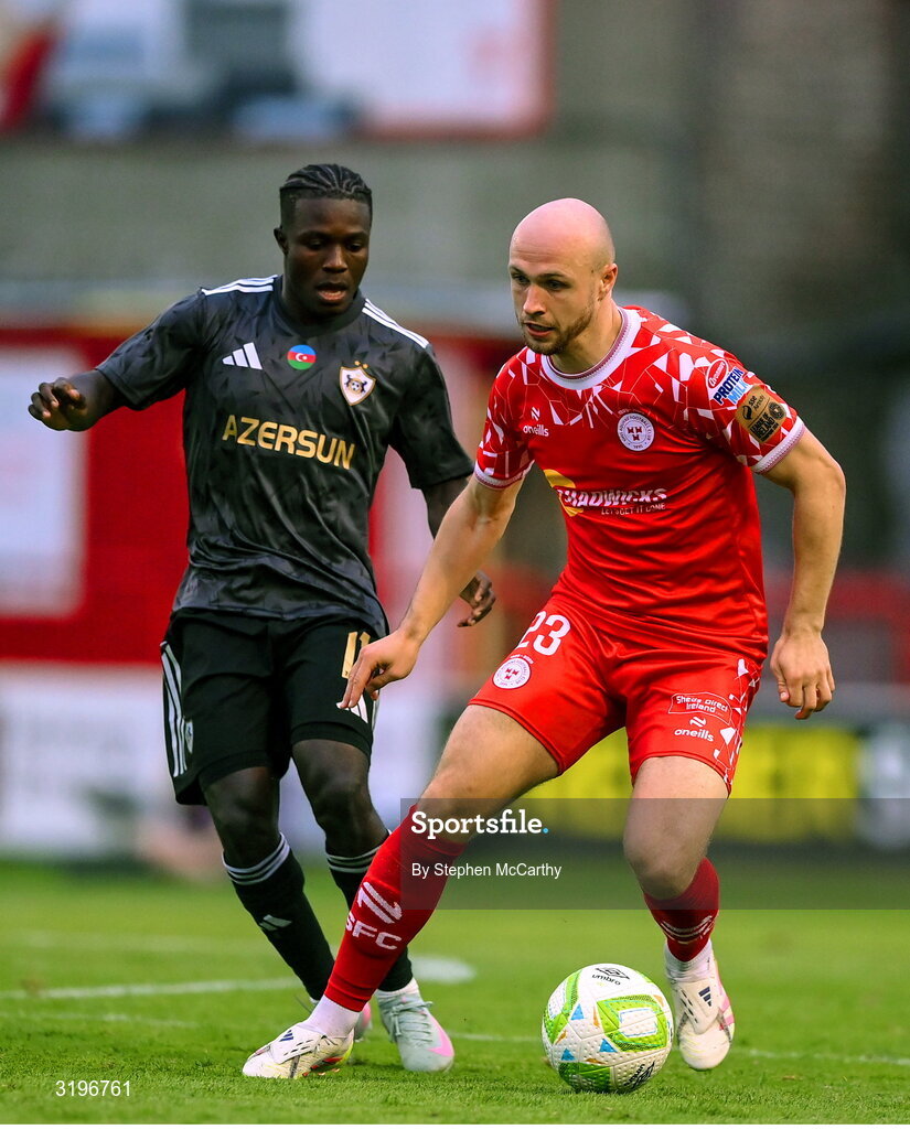 23 July 2025; Kerr McInroy of Shelbourne in action against Emmanuel Addai of Qarabag during the UEFA Champions League Second Qualifying Round first leg match between Shelbourne and Qarabag FK at Tolka Park in Dublin. Photo by Stephen McCarthy/Sportsfile