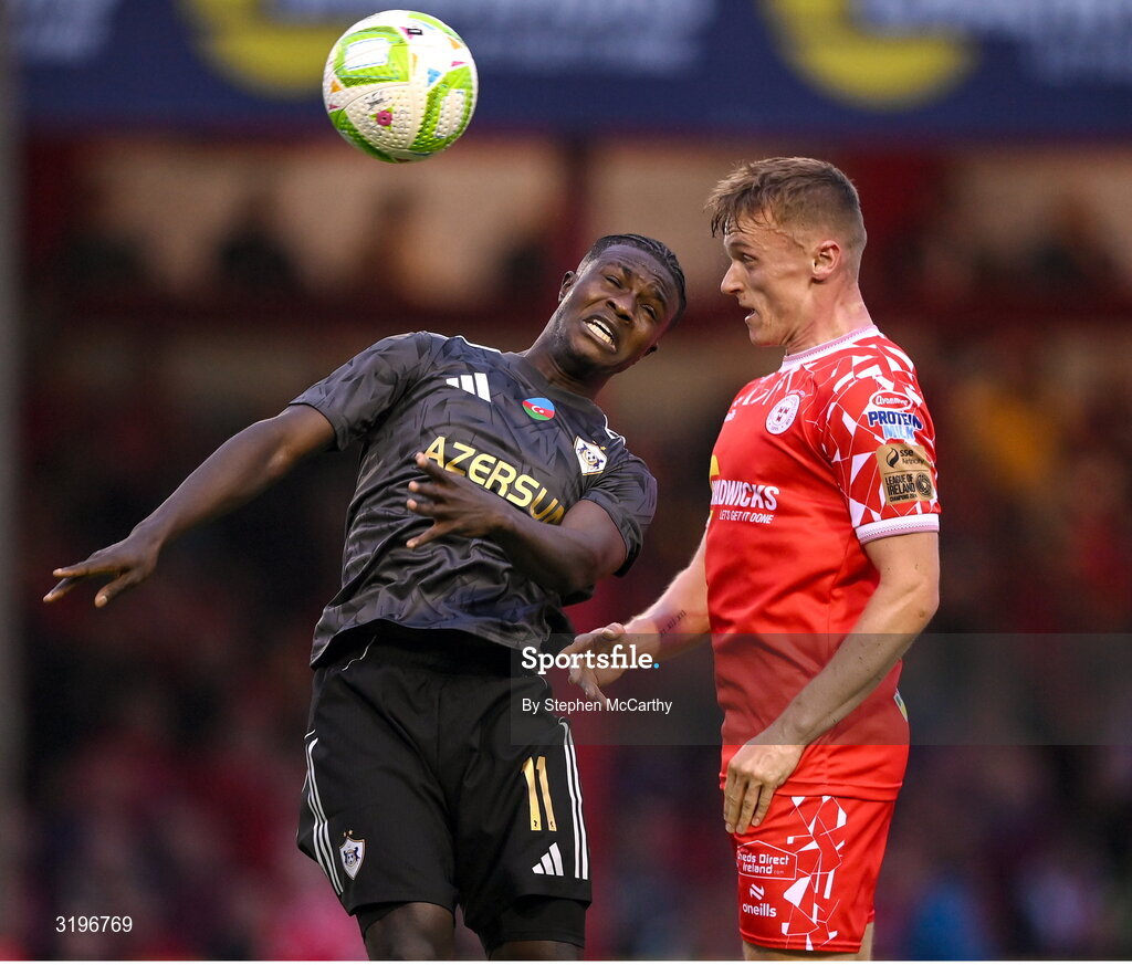 23 July 2025; Emmanuel Addai of Qarabag in action against JJ Lunney of Shelbourne during the UEFA Champions League Second Qualifying Round first leg match between Shelbourne and Qarabag FK at Tolka Park in Dublin. Photo by Stephen McCarthy/Sportsfile