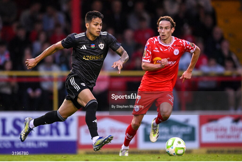 23 July 2025; Matheus Silva of Qarabag in action against Harry Wood of Shelbourne during the UEFA Champions League Second Qualifying Round first leg match between Shelbourne and Qarabag FK at Tolka Park in Dublin. Photo by Stephen McCarthy/Sportsfile