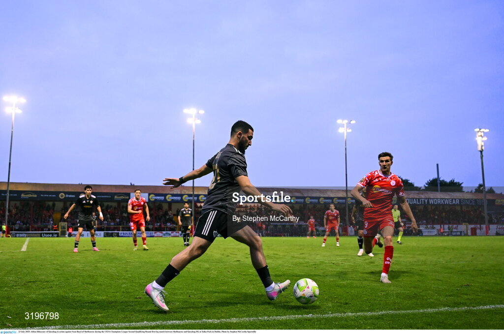 23 July 2025; Abbas Hüseynov of Qarabag in action against Sean Boyd of Shelbourne during the UEFA Champions League Second Qualifying Round first leg match between Shelbourne and Qarabag FK at Tolka Park in Dublin. Photo by Stephen McCarthy/Sportsfile