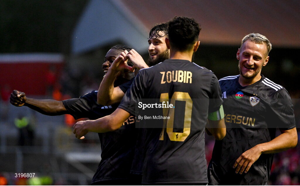 23 July 2025; Nariman Akhundzade of Qarabag, centre, celebrates with teammates, from left, Emmanuel Addai, Abdellah Zoubir and Olexiy Kashchuk after scoring their side's third goal during the UEFA Champions League Second Qualifying Round first leg match between Shelbourne and Qarabag FK at Tolka Park in Dublin. Photo by Ben McShane/Sportsfile