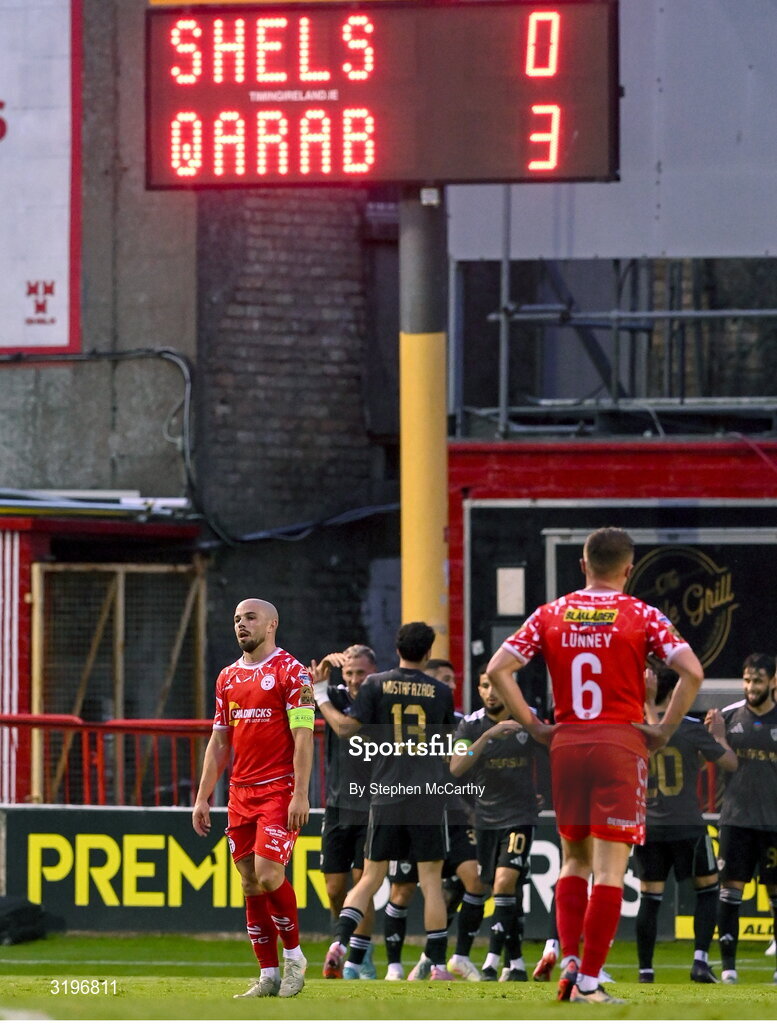 23 July 2025; Mark Coyle of Shelbourne, left, reacts after conceding a third goal during the UEFA Champions League Second Qualifying Round first leg match between Shelbourne and Qarabag FK at Tolka Park in Dublin. Photo by Stephen McCarthy/Sportsfile