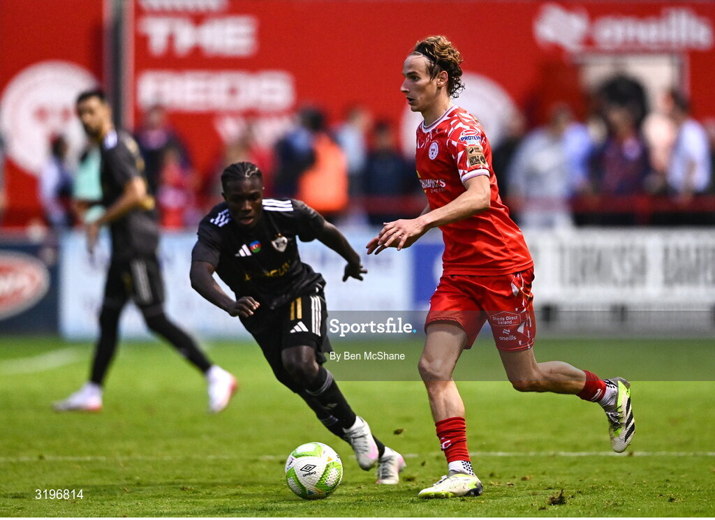 23 July 2025; Harry Wood of Shelbourne in action against Emmanuel Addai of Qarabag during the UEFA Champions League Second Qualifying Round first leg match between Shelbourne and Qarabag FK at Tolka Park in Dublin. Photo by Ben McShane/Sportsfile