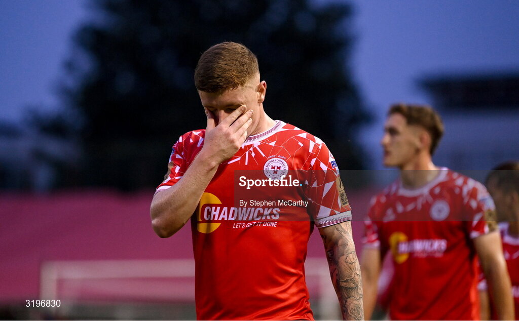 23 July 2025; Kameron Ledwidge of Shelbourne dejected after his side's defeat in the UEFA Champions League Second Qualifying Round first leg match between Shelbourne and Qarabag FK at Tolka Park in Dublin. Photo by Stephen McCarthy/Sportsfile