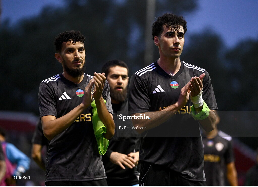 23 July 2025; Abdellah Zoubir of Qarabag, left, and teammate Bahlul Mustafazade applaud their supporters after their side's victory in the UEFA Champions League Second Qualifying Round first leg match between Shelbourne and Qarabag FK at Tolka Park in Dublin. Photo by Ben McShane/Sportsfile