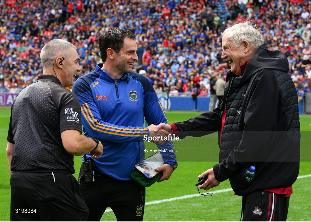 20 July 2025; Dr Con Murphy, right, shakes hands with Tipperary doctor Brendan Murphy in the company of referee Liam Gordon before the GAA Hurling All-Ireland Senior Championship final match between Cork and Tipperary at Croke Park in Dublin. Photo by Ray McManus/Sportsfile
