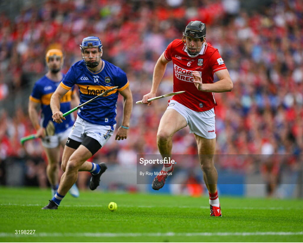 20 July 2025; Robert Downey of Cork in action against John McGrath of Tipperary during the GAA Hurling All-Ireland Senior Championship final match between Cork and Tipperary at Croke Park in Dublin. Photo by Ray McManus/Sportsfile