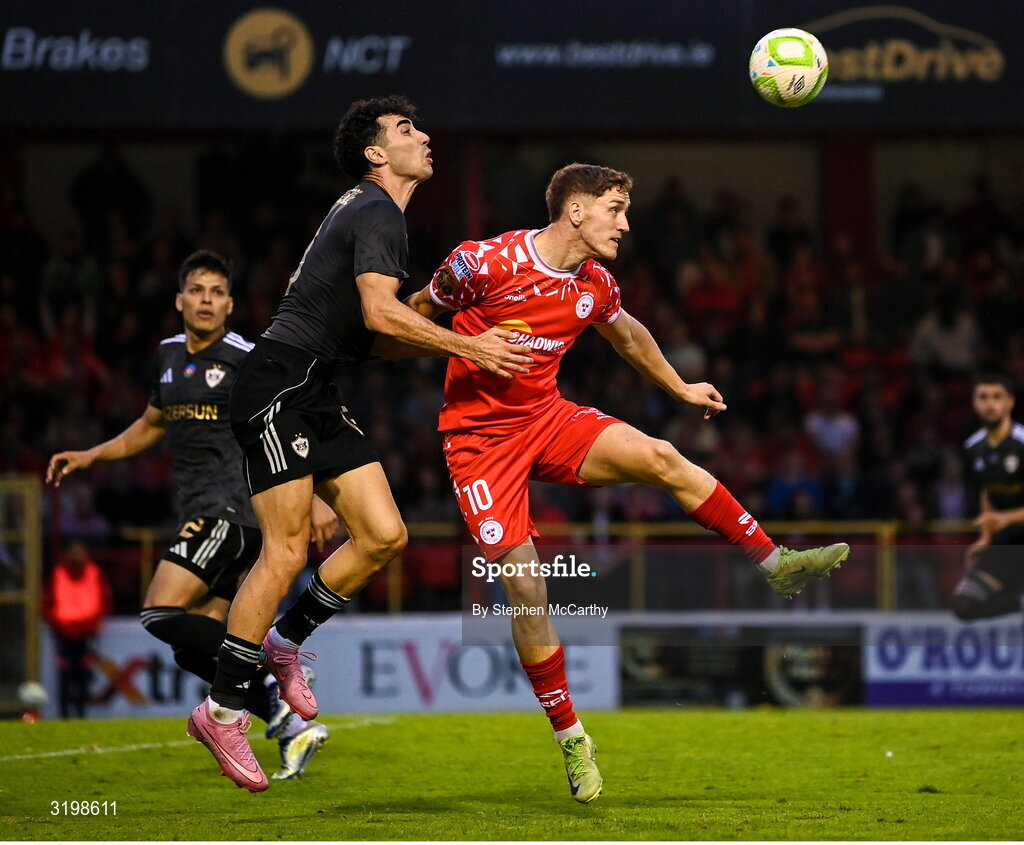 23 July 2025; John Martin of Shelbourne in action against Bahlul Mustafazade of Qarabag during the UEFA Champions League Second Qualifying Round first leg match between Shelbourne and Qarabag FK at Tolka Park in Dublin. Photo by Stephen McCarthy/Sportsfile