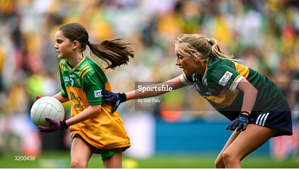 27 July 2025; Lara Waine, St Pius X GNS, Terenure, Dublin, representing Donegal, in action against Bláthnaid Ní Mhochán, Scoil Lachtaín Naofa, Cill na Martra, Cork, representing Kerry, during the GAA INTO Cumann na mBunscol Respect Exhibition Go Games at the GAA Football All-Ireland Senior Championship final match between Kerry and Donegal at Croke Park in Dublin. Photo by Seb Daly/Sportsfile