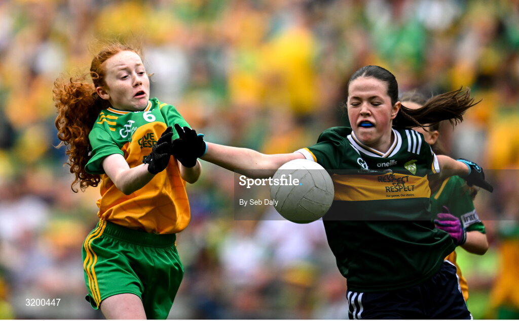 27 July 2025; Úna Kilkenny, St Mary's PS, Mullaghbawn, Armagh, representing Donegal, in action against Ella Roche, Moveen NS, Kilkee, Clare, representing Kerry, during the GAA INTO Cumann na mBunscol Respect Exhibition Go Games at the GAA Football All-Ireland Senior Championship final match between Kerry and Donegal at Croke Park in Dublin. Photo by Seb Daly/Sportsfile