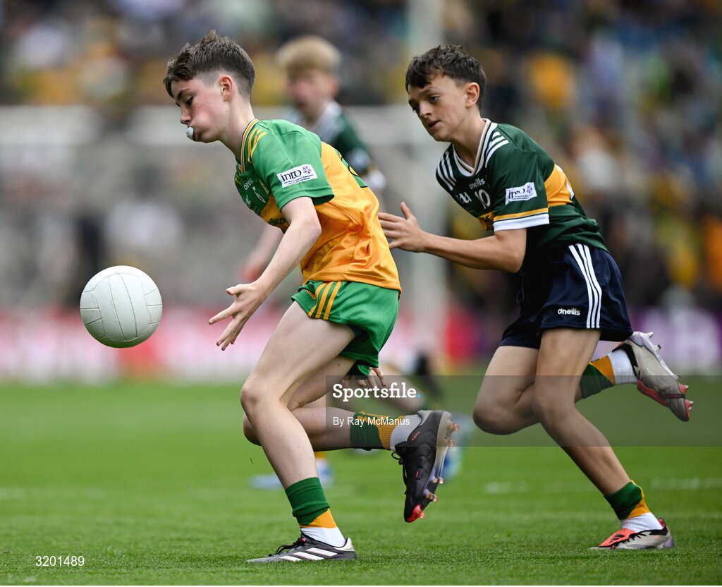 27 July 2025; Oisín Lynch, St Mary's NS, Virginia, Cavan, representing Donegal, and James O'Toole, Scoil Phádraig Naofa, Tullow, Carlow, representing Kerry, during the GAA INTO Cumann na mBunscol Respect Exhibition Go Games at the GAA Football All-Ireland Senior Championship final match between Kerry and Donegal at Croke Park in Dublin. Photo by Ray McManus/Sportsfile