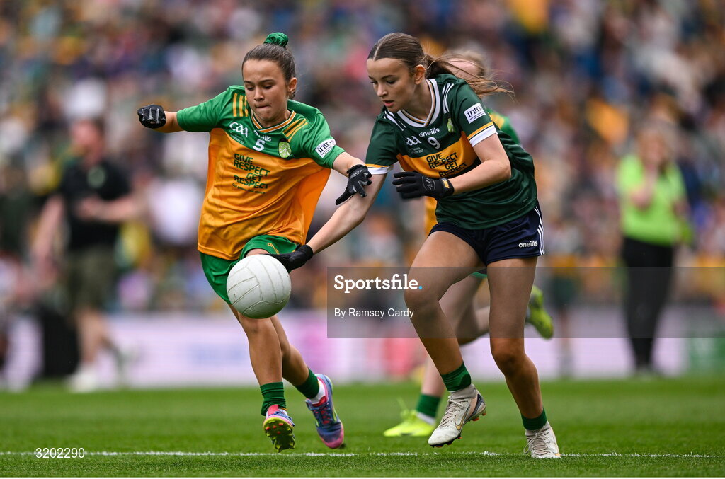 27 July 2025; Emily Kavanagh, St Colman's NS, Mucklagh, Offaly, representing Kerry, and Grace McGonigle, Gaelscoil Cois Feabhaill, Moville, Donegal, during the GAA INTO Cumann na mBunscol Respect Exhibition Go Games at the GAA Football All-Ireland Senior Championship final match between Kerry and Donegal at Croke Park in Dublin. Photo by Ramsey Cardy/Sportsfile