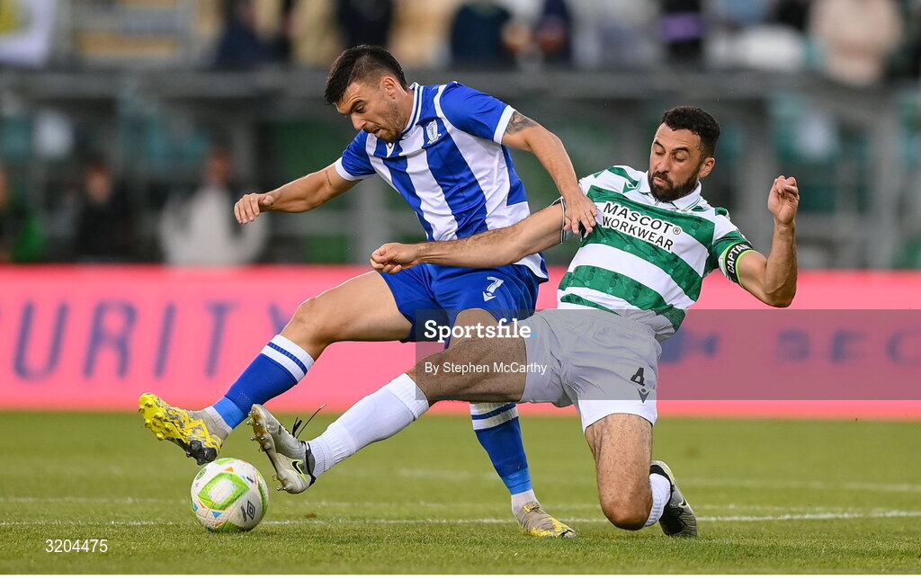 31 July 2025; Javi Forján of St Joseph's is tackled by Roberto Lopes of Shamrock Rovers during the UEFA Conference League Second Qualifying Round second leg match between Shamrock Rovers and St Joseph's at Tallaght Stadium in Dublin. Photo by Stephen McCarthy/Sportsfile