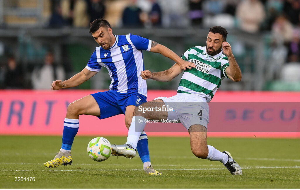 31 July 2025; Javi Forján of St Joseph's is tackled by Roberto Lopes of Shamrock Rovers during the UEFA Conference League Second Qualifying Round second leg match between Shamrock Rovers and St Joseph's at Tallaght Stadium in Dublin. Photo by Stephen McCarthy/Sportsfile