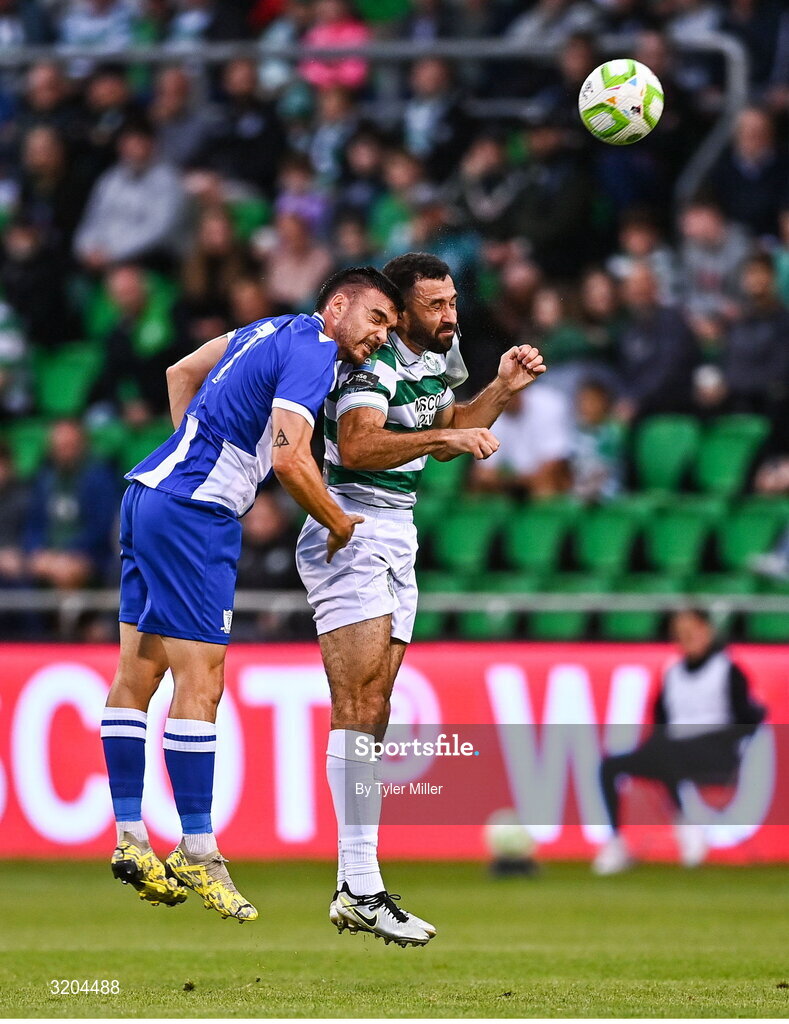 31 July 2025; Roberto Lopes of Shamrock Rovers and Javi Forján of St Joseph's contest a header during the UEFA Conference League Second Qualifying Round second leg match between Shamrock Rovers and St Joseph's at Tallaght Stadium in Dublin. Photo by Tyler Miller/Sportsfile