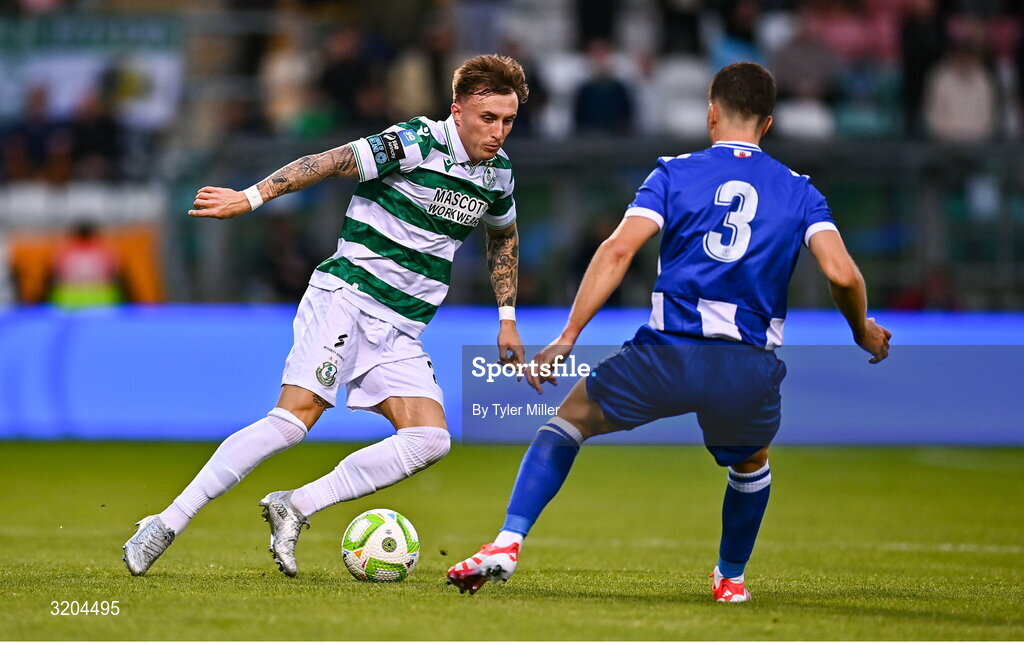 31 July 2025; Danny Grant of Shamrock Rovers in action against Jayce Olivero of St Joseph's during the UEFA Conference League Second Qualifying Round second leg match between Shamrock Rovers and St Joseph's at Tallaght Stadium in Dublin. Photo by Tyler Miller/Sportsfile