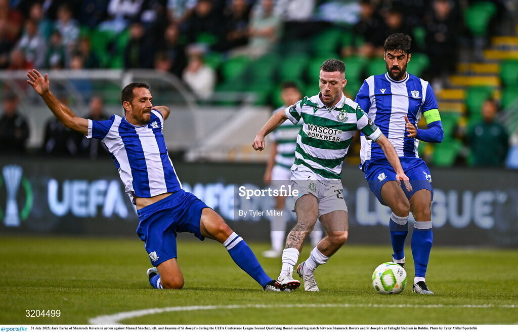 31 July 2025; Jack Byrne of Shamrock Rovers in action against Manuel Sánchez, left, and Juanma of St Joseph's during the UEFA Conference League Second Qualifying Round second leg match between Shamrock Rovers and St Joseph's at Tallaght Stadium in Dublin. Photo by Tyler Miller/Sportsfile