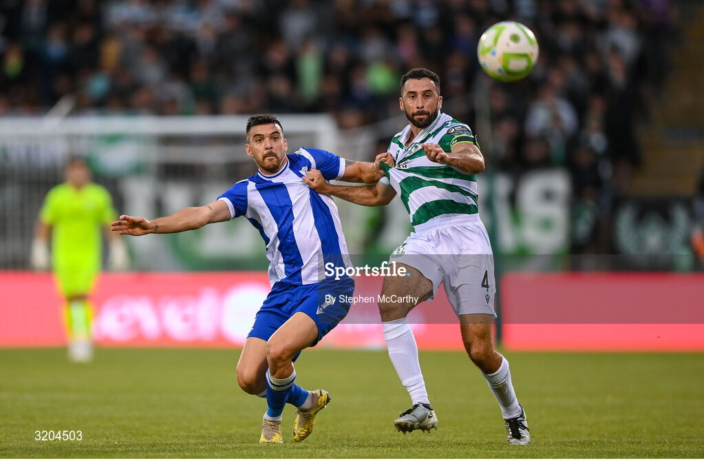 31 July 2025; Roberto Lopes of Shamrock Rovers is tackled by Javi Forján of St Joseph's during the UEFA Conference League Second Qualifying Round second leg match between Shamrock Rovers and St Joseph's at Tallaght Stadium in Dublin. Photo by Stephen McCarthy/Sportsfile