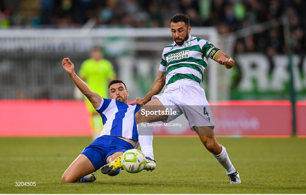 31 July 2025; Roberto Lopes of Shamrock Rovers is tackled by Javi Forján of St Joseph's during the UEFA Conference League Second Qualifying Round second leg match between Shamrock Rovers and St Joseph's at Tallaght Stadium in Dublin. Photo by Stephen McCarthy/Sportsfile