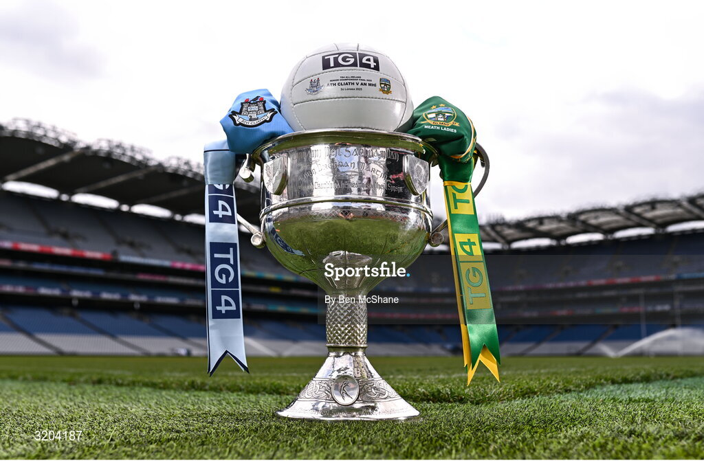 1 August 2025; The Brendan Martin Cup, the official matchday ball and the jerseys that Dublin and Meath will wear in next Sunday’s TG4 All-Ireland Ladies Senior Football Championship Final, pictured at Croke Park, Dublin. Photo by Ben McShane/Sportsfile