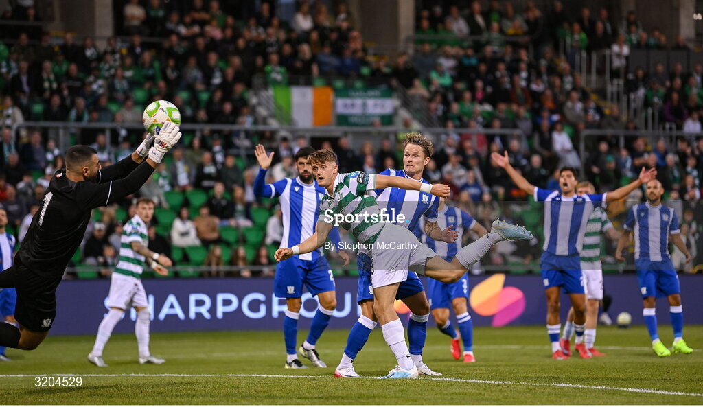 31 July 2025; John McGovern of Shamrock Rovers has a header on goal saved by St Joseph's goalkeeper Bradley Banda during the UEFA Conference League Second Qualifying Round second leg match between Shamrock Rovers and St Joseph's at Tallaght Stadium in Dublin. Photo by Stephen McCarthy/Sportsfile
