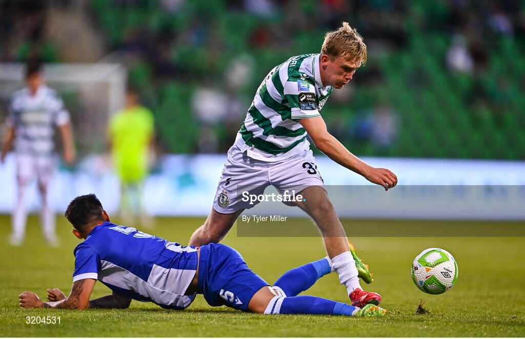 31 July 2025; Michael Noonan of Shamrock Rovers is tackled by Geovanni Barba of St Joseph's during the UEFA Conference League Second Qualifying Round second leg match between Shamrock Rovers and St Joseph's at Tallaght Stadium in Dublin. Photo by Tyler Miller/Sportsfile