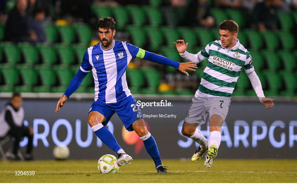 31 July 2025; Juanma of St Joseph's in action against Dylan Watts of Shamrock Rovers during the UEFA Conference League Second Qualifying Round second leg match between Shamrock Rovers and St Joseph's at Tallaght Stadium in Dublin. Photo by Stephen McCarthy/Sportsfile