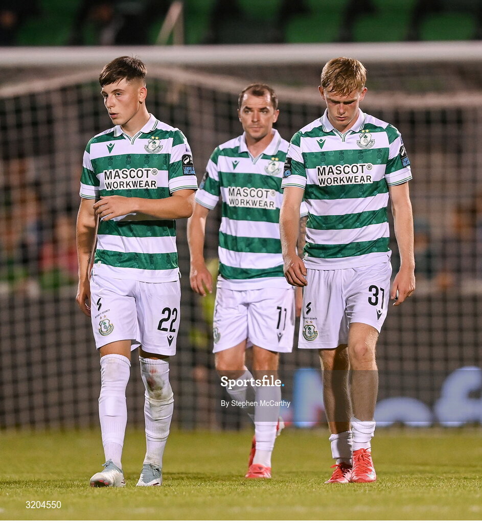 31 July 2025; Shamrock Rovers players, from left, Cian Barrett, Sean Kavanagh and Michael Noonan react at the final whistle of the UEFA Conference League Second Qualifying Round second leg match between Shamrock Rovers and St Joseph's at Tallaght Stadium in Dublin. Photo by Stephen McCarthy/Sportsfile