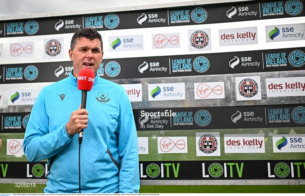1 August 2025; Drogheda United manager Kevin Doherty is interviewed by Virgin Media Sport before the SSE Airtricity Men's Premier Division match between Bohemians and Drogheda United at Dalymount Park in Dublin. Photo by Seb Daly/Sportsfile