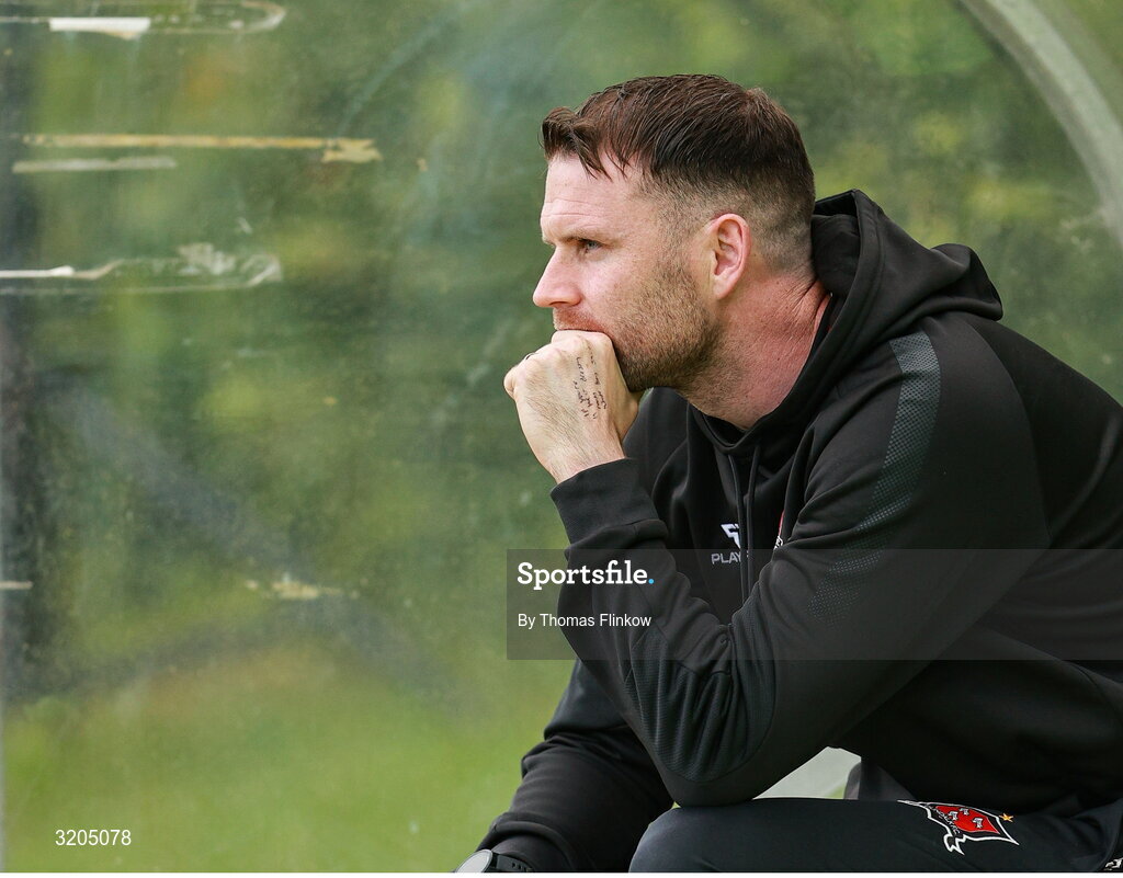 1 August 2025; Dundalk manager Ciarán Kilduff sits in the dugout before the SSE Airtricity Men's First Division match between UCD and Dundalk at UCD Bowl in Belfield, Dublin. Photo by Thomas Flinkow/Sportsfile