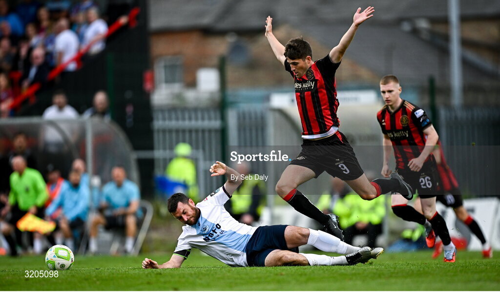 1 August 2025; Ryan Brennan of Drogheda United in action against Colm Whelan of Bohemians during the SSE Airtricity Men's Premier Division match between Bohemians and Drogheda United at Dalymount Park in Dublin. Photo by Seb Daly/Sportsfile