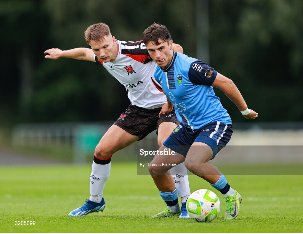 1 August 2025; Mikey McCullagh of UCD in action against John Ross Wilson of Dundalk during the SSE Airtricity Men's First Division match between UCD and Dundalk at UCD Bowl in Belfield, Dublin. Photo by Thomas Flinkow/Sportsfile