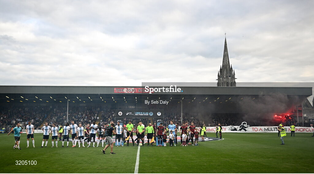 1 August 2025; Players and officials shake hands before the SSE Airtricity Men's Premier Division match between Bohemians and Drogheda United at Dalymount Park in Dublin. Photo by Seb Daly/Sportsfile