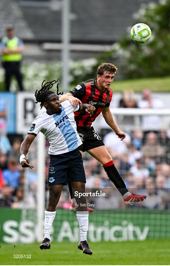 1 August 2025; Cian Byrne of Bohemians in action against Thomas Oluwa of Drogheda United during the SSE Airtricity Men's Premier Division match between Bohemians and Drogheda United at Dalymount Park in Dublin. Photo by Seb Daly/Sportsfile