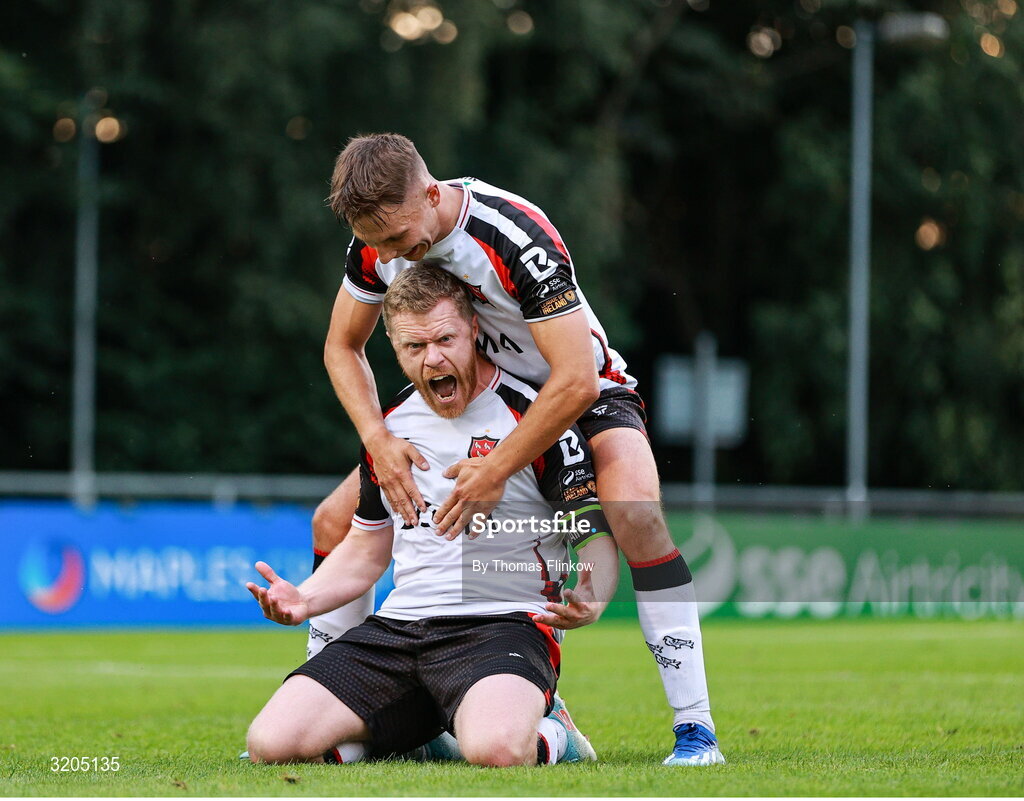 1 August 2025; Daryl Horgan of Dundalk, front, celebrates with teammate John Ross Wilson after scoring his side's first goal, a penalty, during the SSE Airtricity Men's First Division match between UCD and Dundalk at UCD Bowl in Belfield, Dublin. Photo by Thomas Flinkow/Sportsfile
