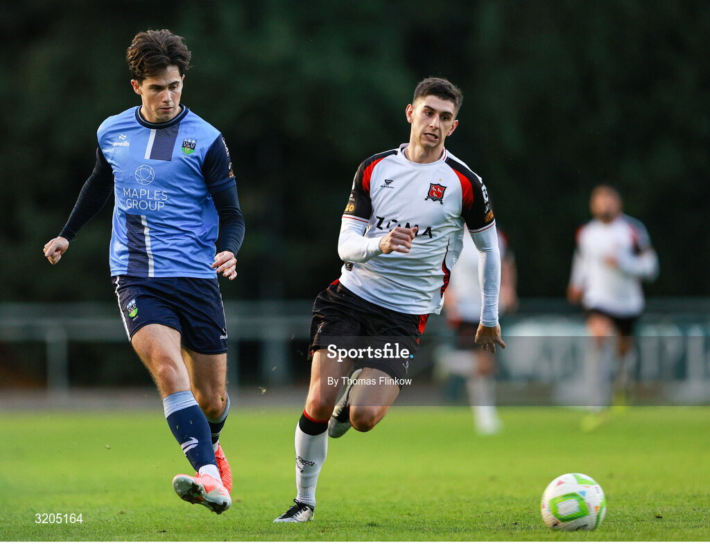 1 August 2025; Adam Verdon of UCD in action against Harry Groome of Dundalk during the SSE Airtricity Men's First Division match between UCD and Dundalk at UCD Bowl in Belfield, Dublin. Photo by Thomas Flinkow/Sportsfile