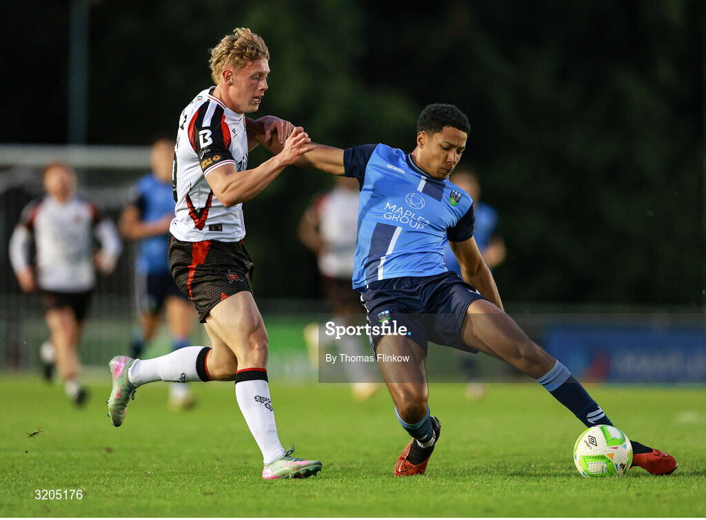1 August 2025; Rohan Vaughan of Dundalk in action against Sean Brennan of UCD during the SSE Airtricity Men's First Division match between UCD and Dundalk at UCD Bowl in Belfield, Dublin. Photo by Thomas Flinkow/Sportsfile