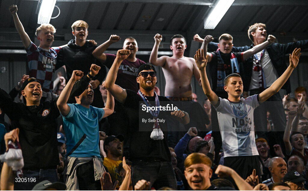 1 August 2025; Drogheda United supporters celebrate after his side's victory in the SSE Airtricity Men's Premier Division match between Bohemians and Drogheda United at Dalymount Park in Dublin. Photo by Seb Daly/Sportsfile