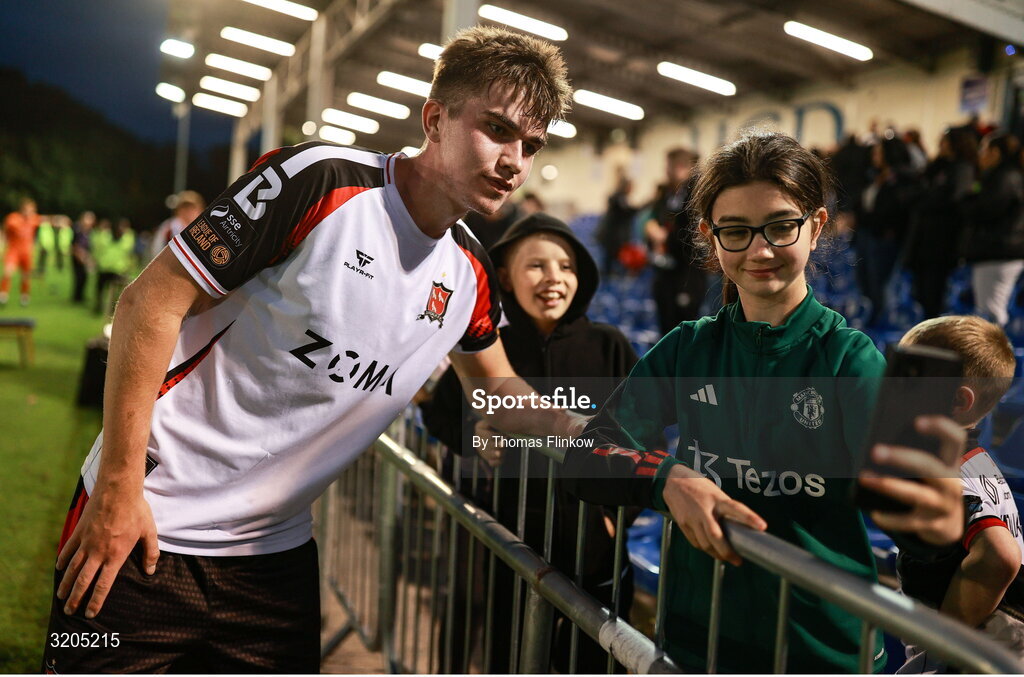 1 August 2025; Eoin Kenny of Dundalk has his photo taken with a supporter after the SSE Airtricity Men's First Division match between UCD and Dundalk at UCD Bowl in Belfield, Dublin. Photo by Thomas Flinkow/Sportsfile